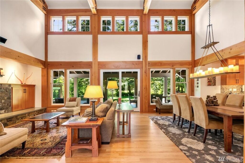 a living room filled with furniture and a fire place.