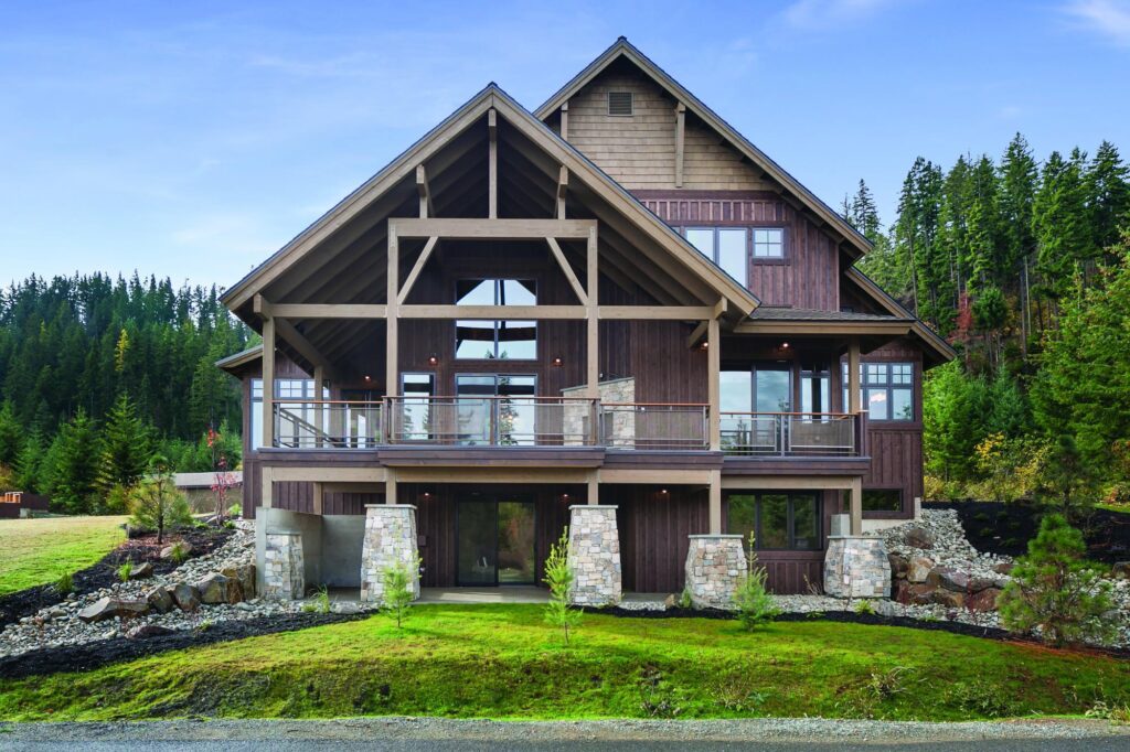 a large house with a lot of windows and a balcony.