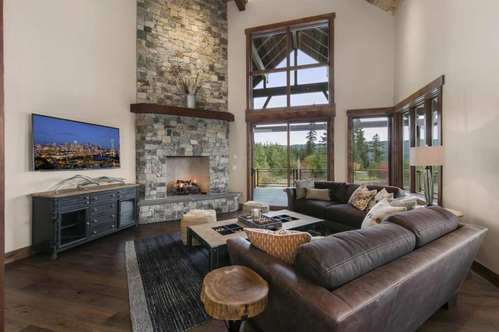 a living room filled with furniture and a flat screen tv.